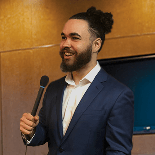 Josh Pocock speaking on stage